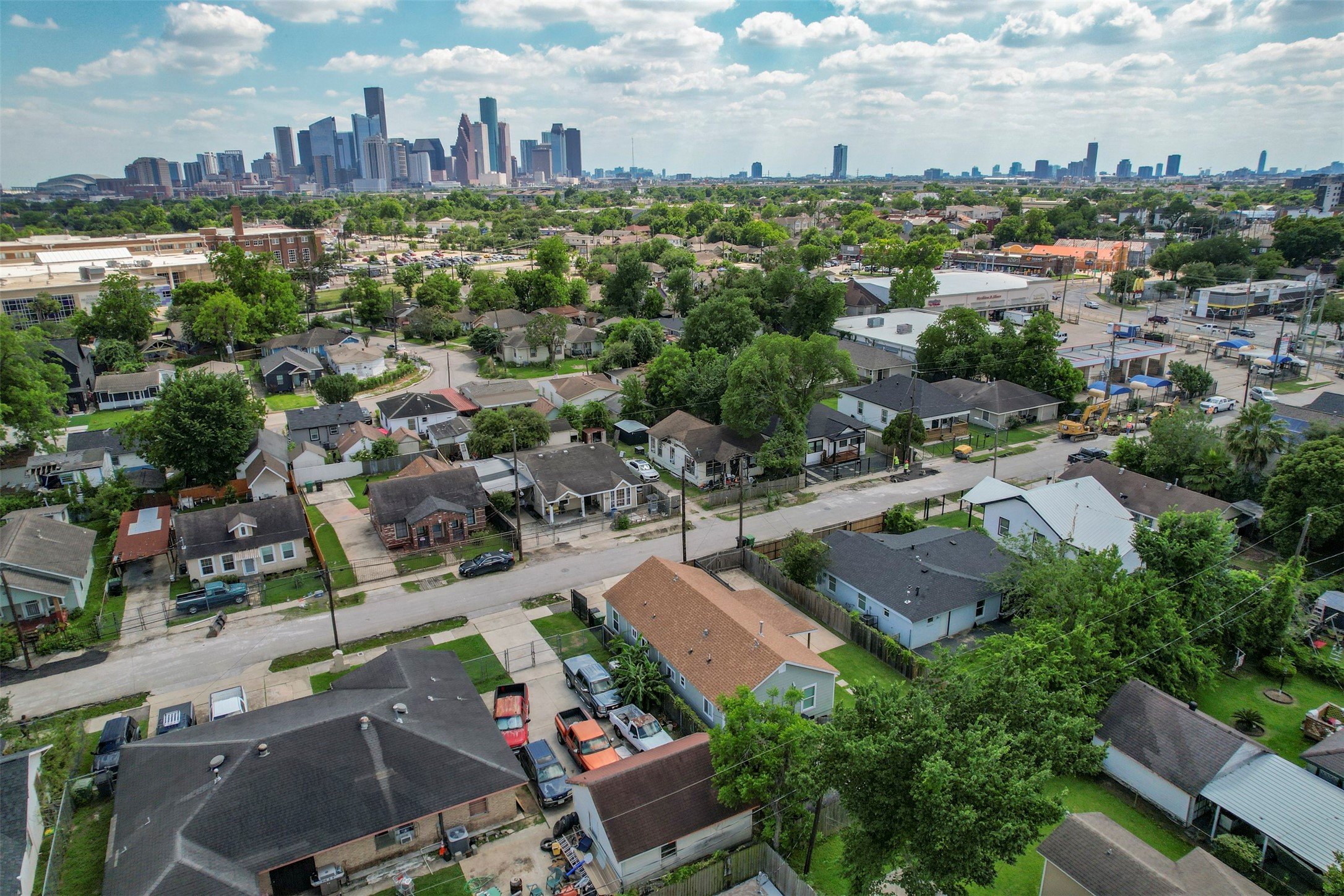 1121 Panama Street Houston, TX 77009 - Photo 32 of 35 Wide aerial showcasing the Near Northside neighborhood with unobstructed Downtown Houston skyline views, demonstrating the property's prime urban location and strong appreciation corridor.