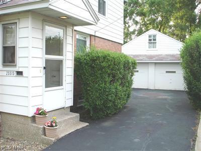 25515 Tungsten Road Euclid, OH 44132 - Photo 2 of 19 2-car garage is great for the winter and has upstairs storage!