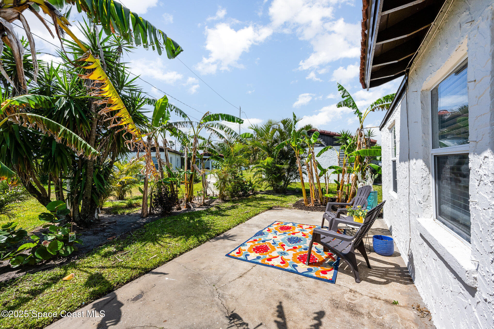 121 Del Flora Indialantic, FL 32903 - Photo 14 of 15 a view of yard with outdoor seating