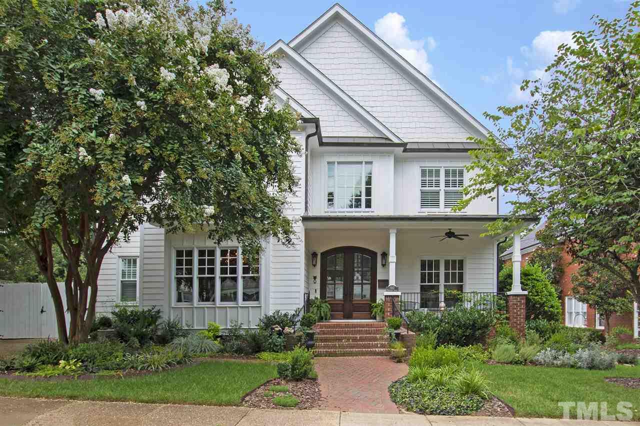 1907 McCarthy Street Raleigh, NC 27608 - Photo 1 of 30 a view of house with garden and tall tree