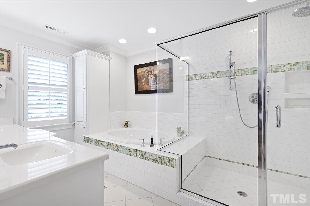1907 McCarthy Street Raleigh, NC 27608 - Photo 22 of 30 a bathroom with a sink and a shower