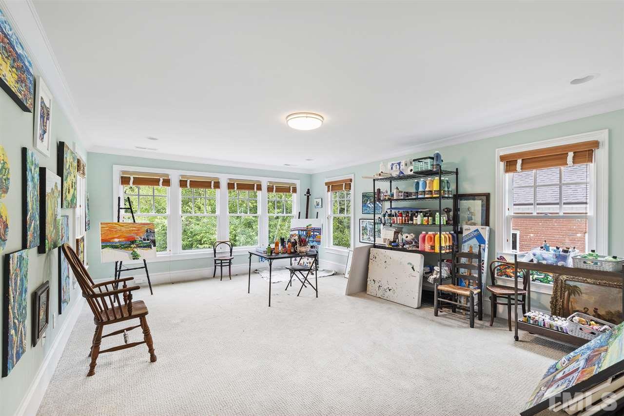 1907 McCarthy Street Raleigh, NC 27608 - Photo 28 of 30 a room with furniture and a window