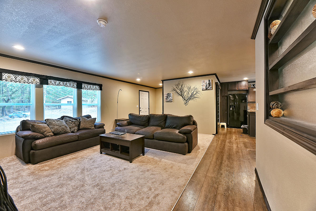 1011 Ferry Road Grants Pass, OR 97526 - Photo 4 of 21 a living room with furniture and a large window
