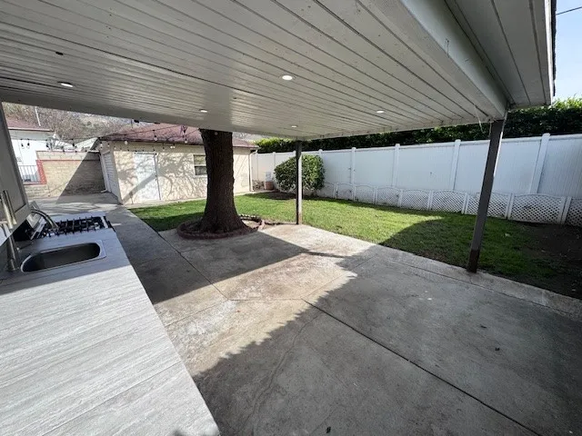 a backyard of a house with garden