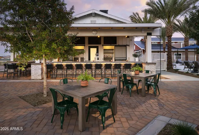 a view of a table and chairs in patio