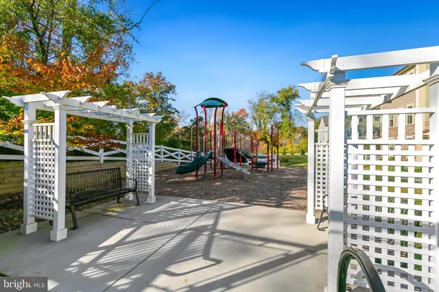 a view of a park with swings