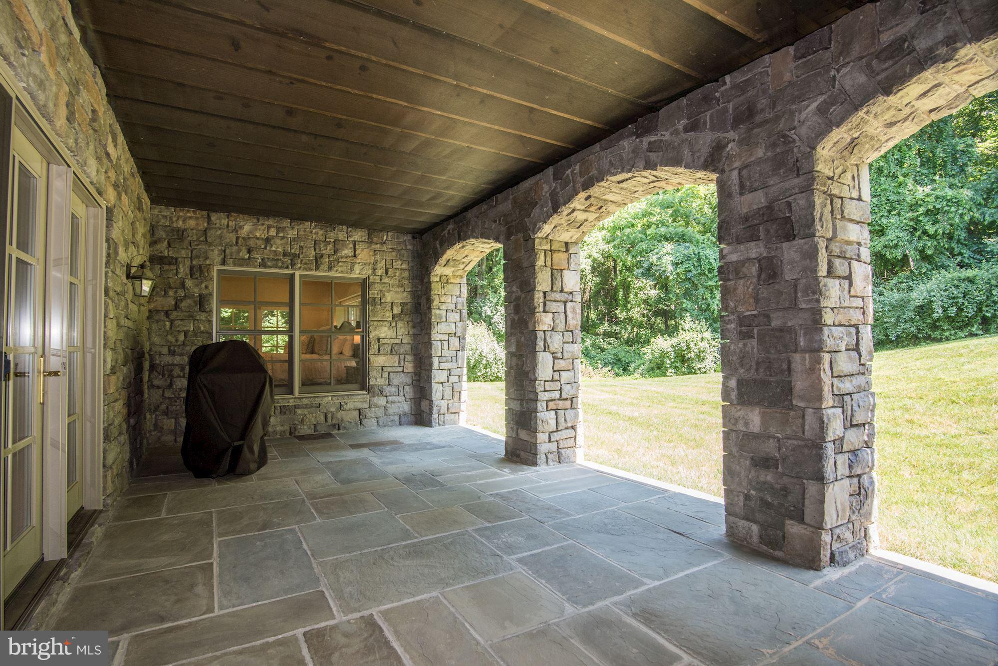 13300 Query Mill Road North Potomac, MD 20878 - Photo 29 of 30 Covered, slate patio - off rec room