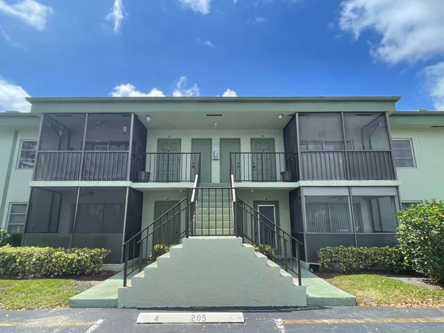 a view of house with deck