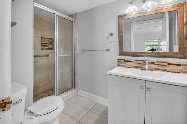 a bathroom with a sink and mirror