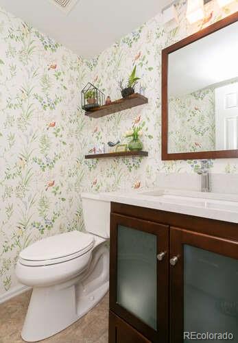 9772 Quay Loop Westminster, CO 80021 - Photo 12 of 36 a bathroom with a toilet and a sink