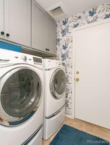 9772 Quay Loop Westminster, CO 80021 - Photo 19 of 36 a utility room with dryer and washer