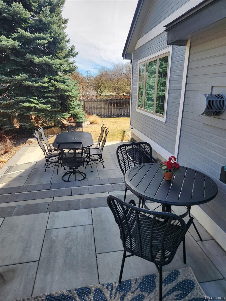 9772 Quay Loop Westminster, CO 80021 - Photo 34 of 36 a view of a outdoor seating area with furniture
