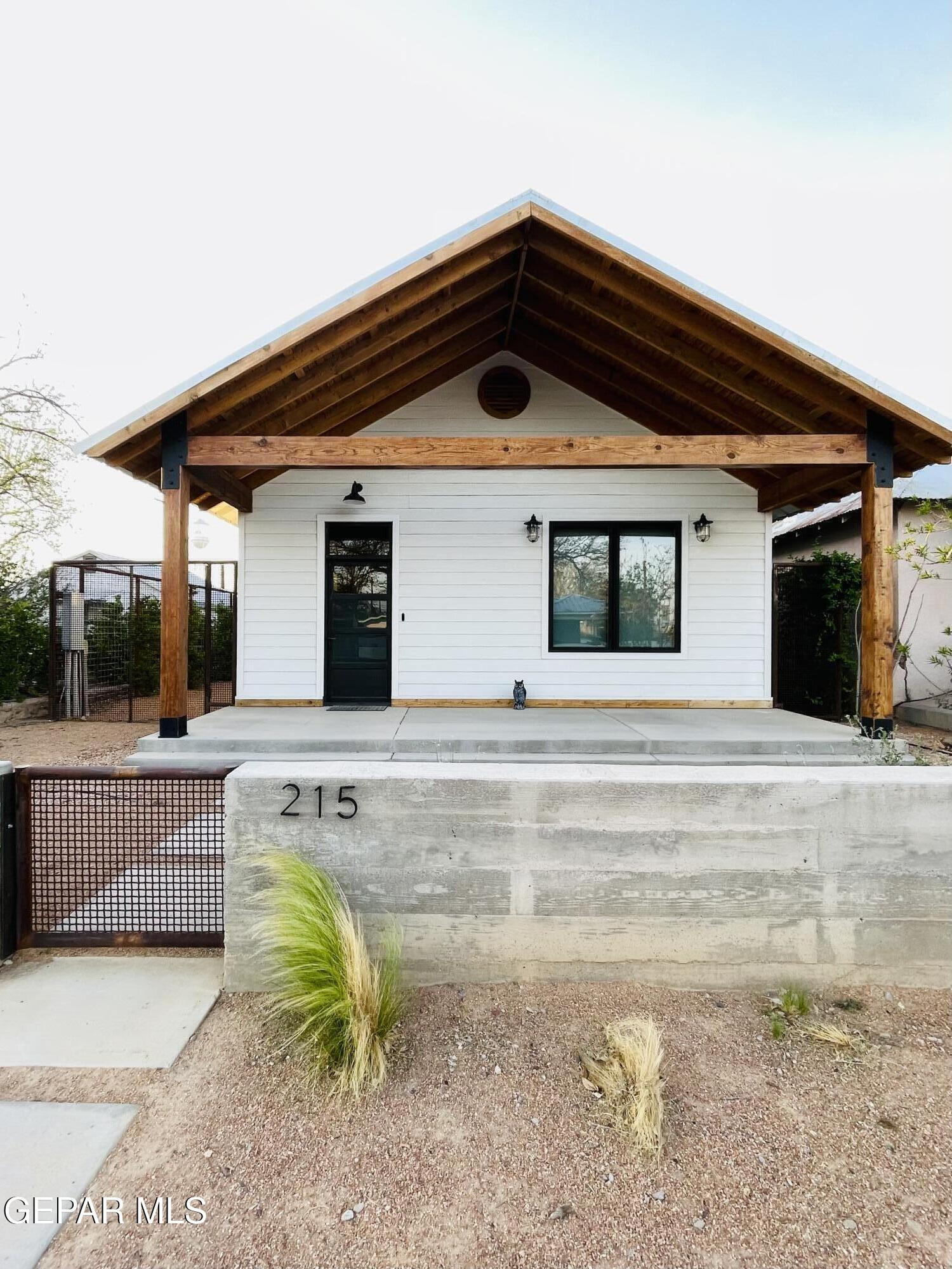 215 East Texas Street Marfa, TX 79843 - Photo 1 of 15 a view of a house with a swimming pool