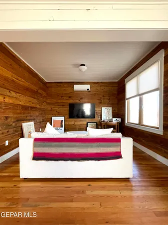 a view of water heater room with a large window