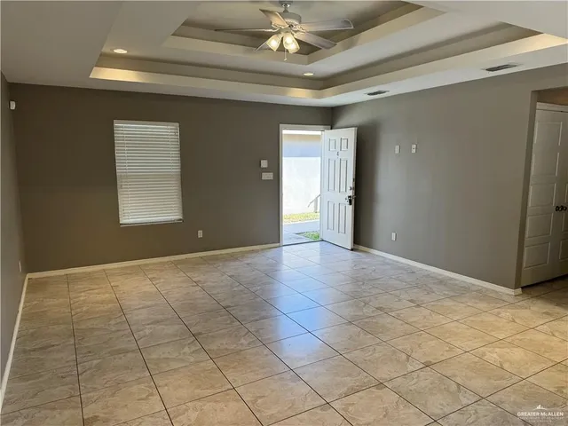 a view of an empty room and window