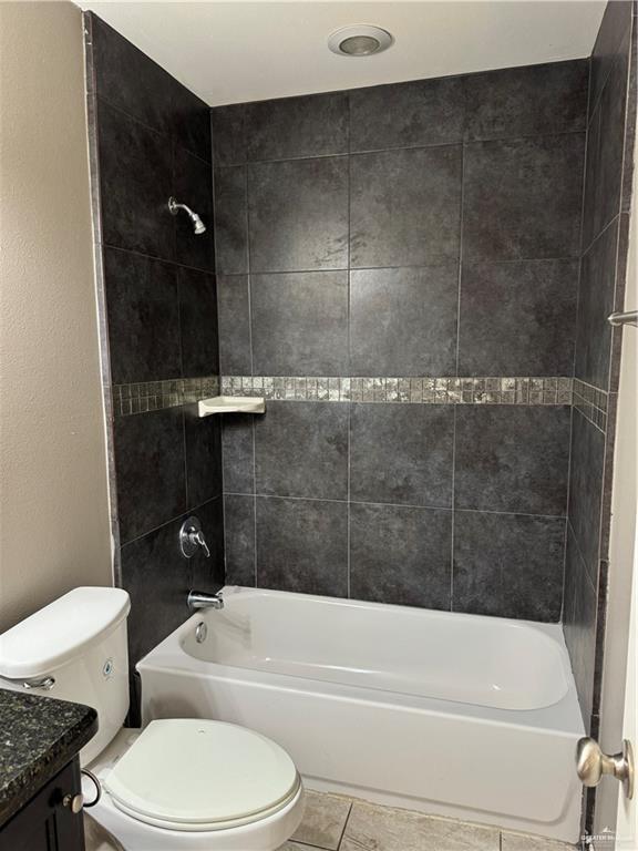 4709 North Ebony Street, Unit 3 Pharr, TX 78577 - Photo 10 of 11 a bathroom with a toilet and a tub