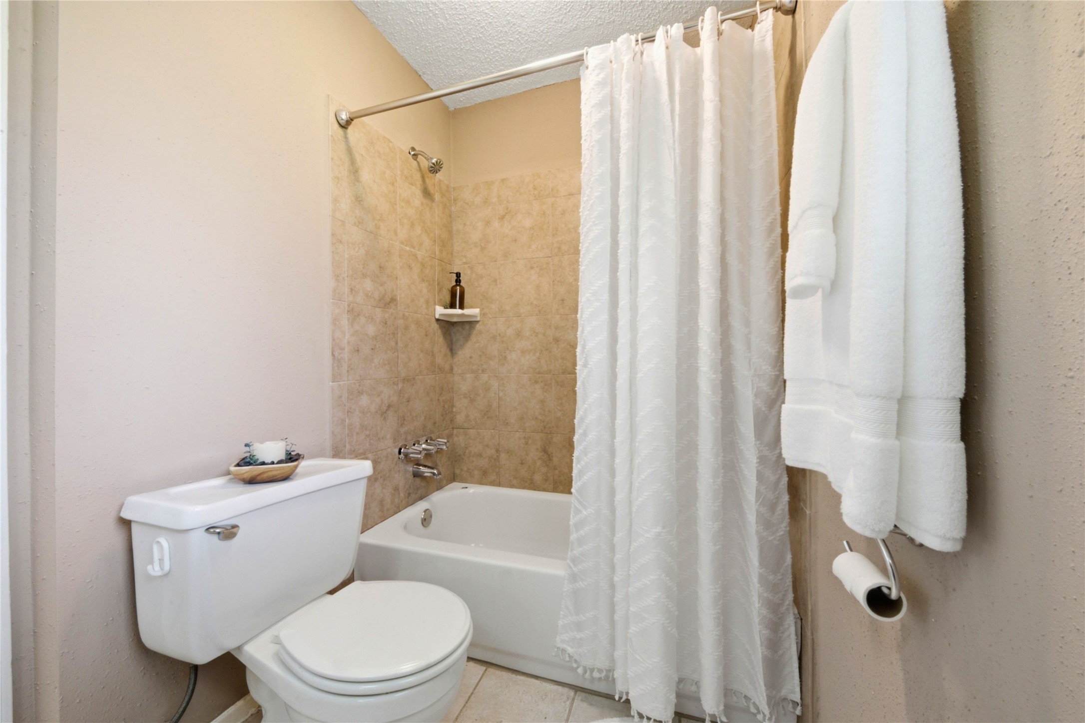 4019 Postwood Drive Spring, TX 77388 - Photo 27 of 50 a white toilet sitting next to a bathroom sink