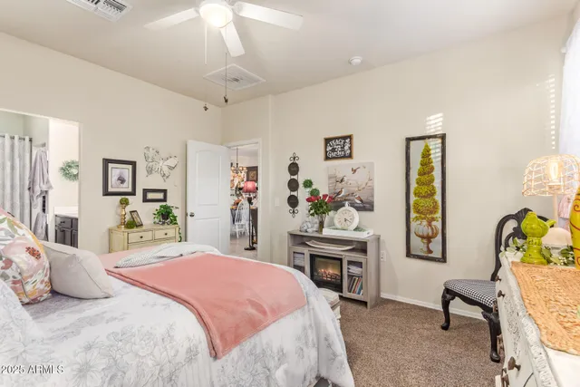 a bedroom with a bed and furniture