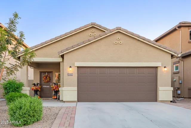 a view of a car garage of the house
