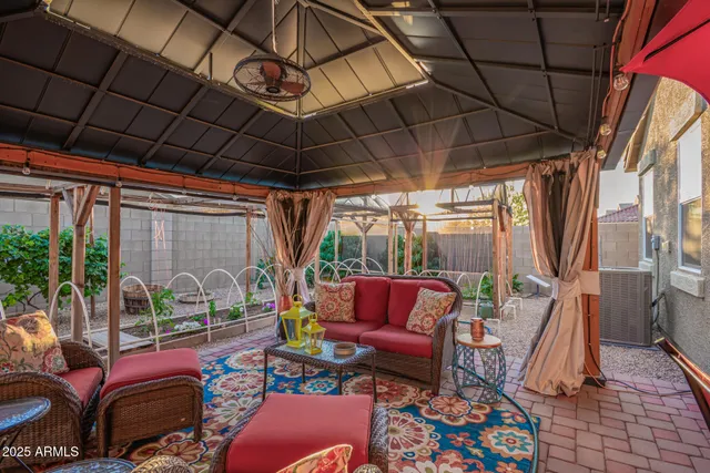 a view of a chairs and tables in patio