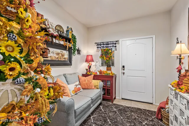 a living room with furniture and a window
