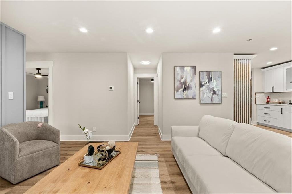 4203 Annistown Road Snellville, GA 30039 - Photo 13 of 32 a living room with furniture and a couch