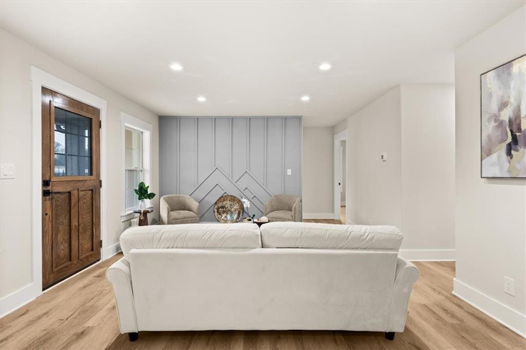 4203 Annistown Road Snellville, GA 30039 - Photo 14 of 32 a living room with furniture and a window