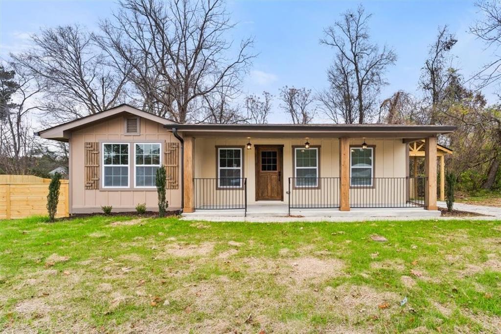 4203 Annistown Road Snellville, GA 30039 - Photo 2 of 32 front view of a house with a yard