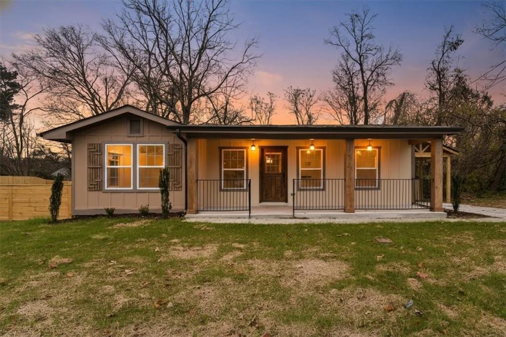 4203 Annistown Road Snellville, GA 30039 - Photo 32 of 32 front view of a house with a yard