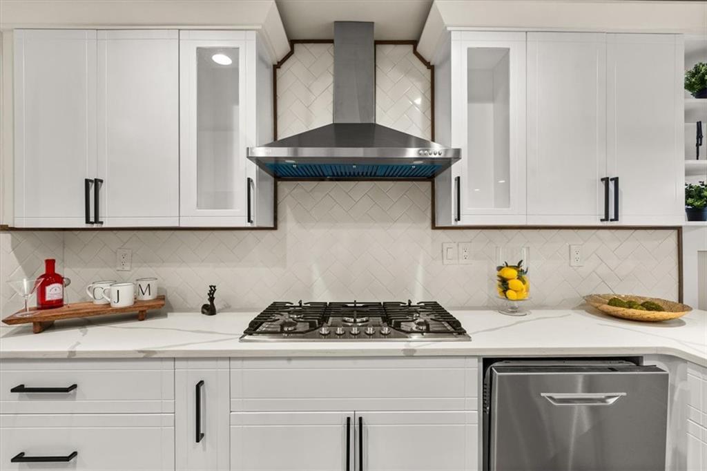 4203 Annistown Road Snellville, GA 30039 - Photo 5 of 32 a kitchen with a stove and cabinets