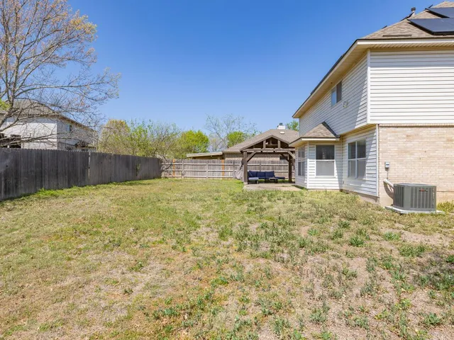 a house view with garden space