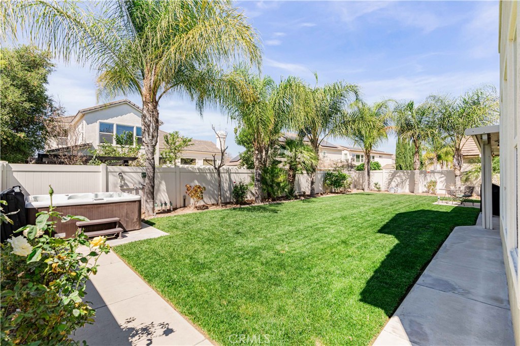 32016 Woodside Court Temecula, CA 92592 - Photo 30 of 40 a front view of a house with garden