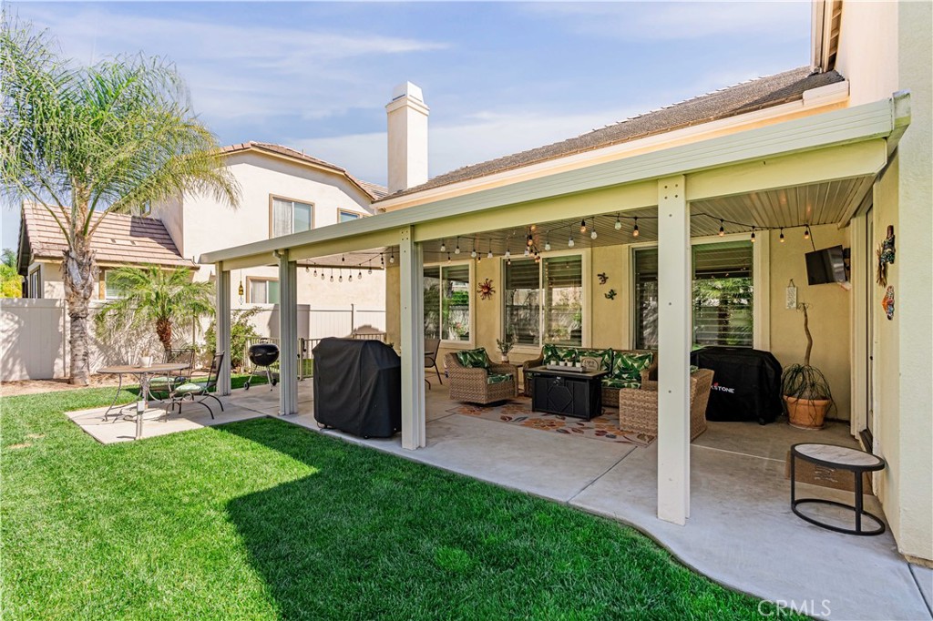 32016 Woodside Court Temecula, CA 92592 - Photo 32 of 40 a view of a house with backyard and porch