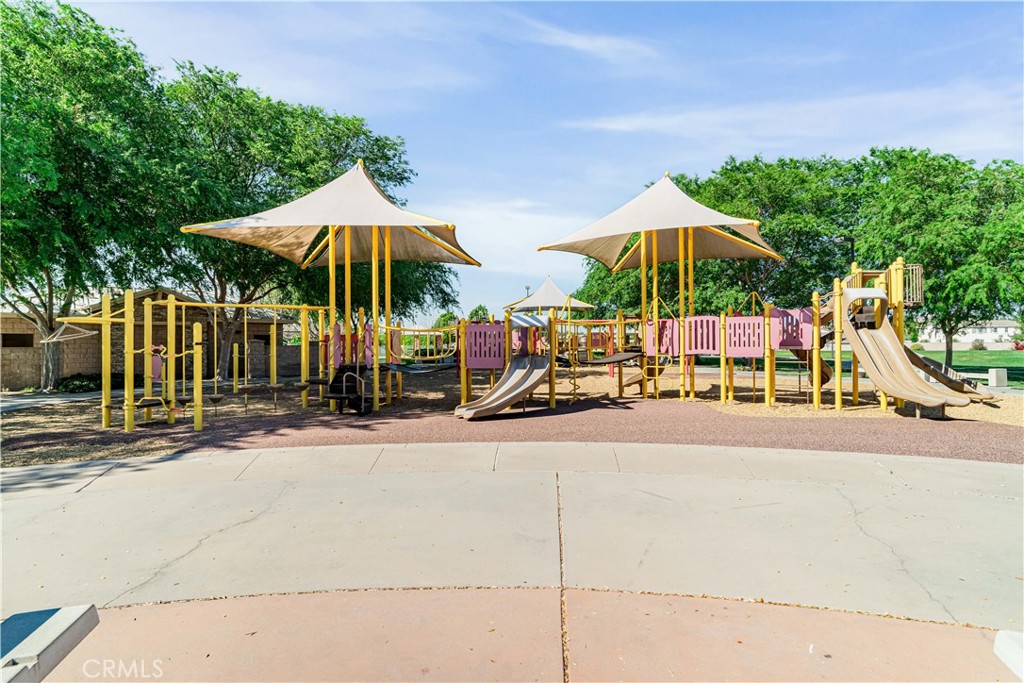 32016 Woodside Court Temecula, CA 92592 - Photo 37 of 40 a view of street with a table and chairs under an umbrella