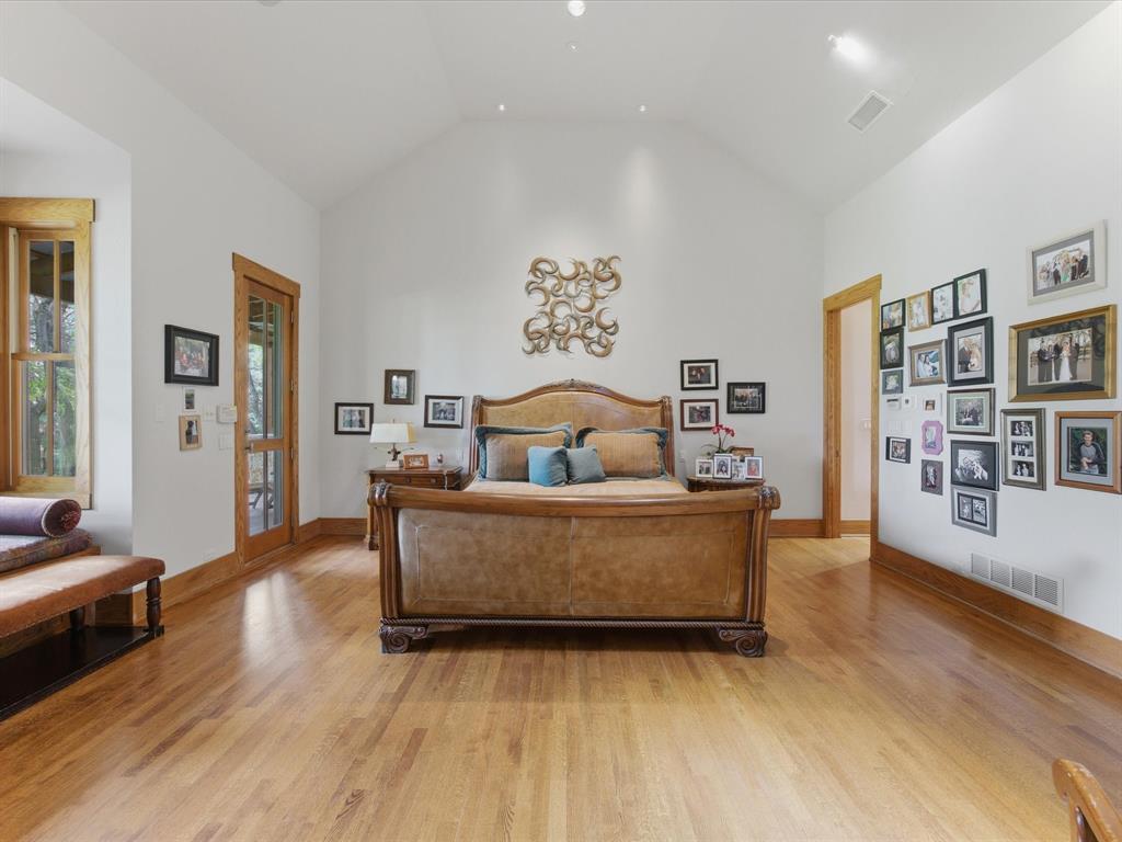 151 Trinity Bluffs Road Aledo, TX 76008 - Photo 22 of 40 a living room with furniture and wooden floor