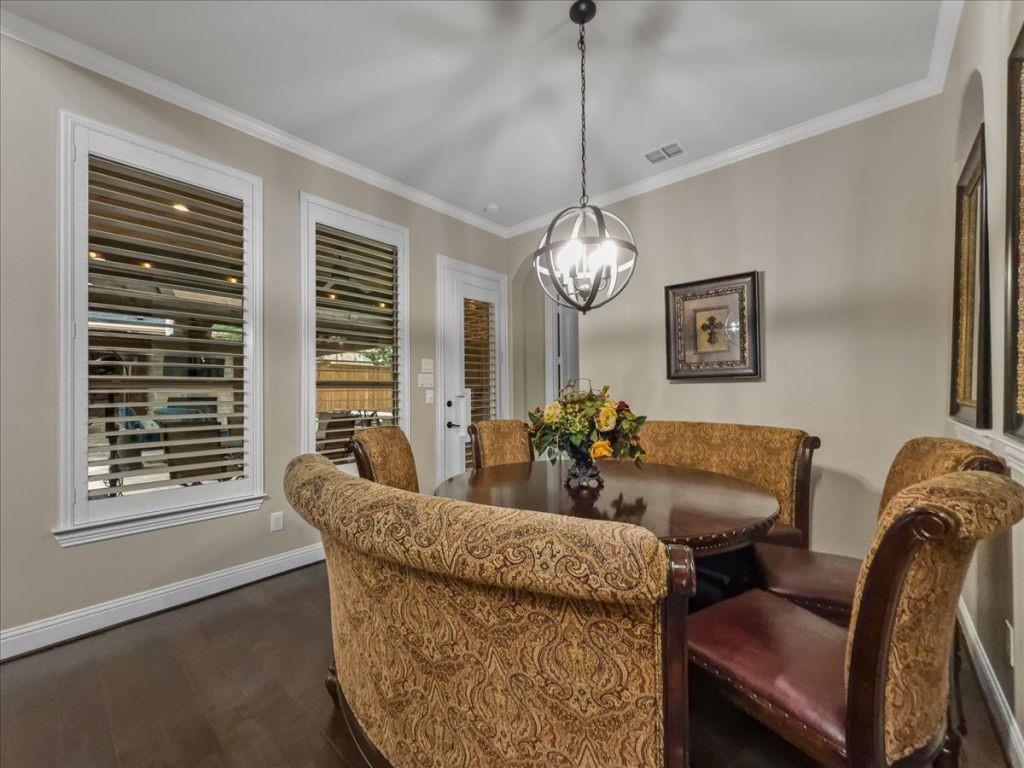 2832 Mona Vale Road Trophy Club, TX 76262 - Photo 10 of 37 a view of a dining room with furniture and chandelier