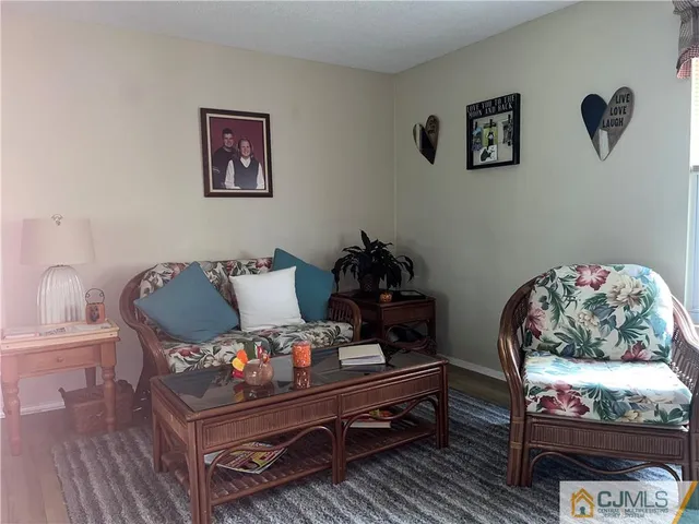 a bed room with furniture and a window