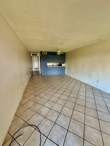 a view of a room & utility room