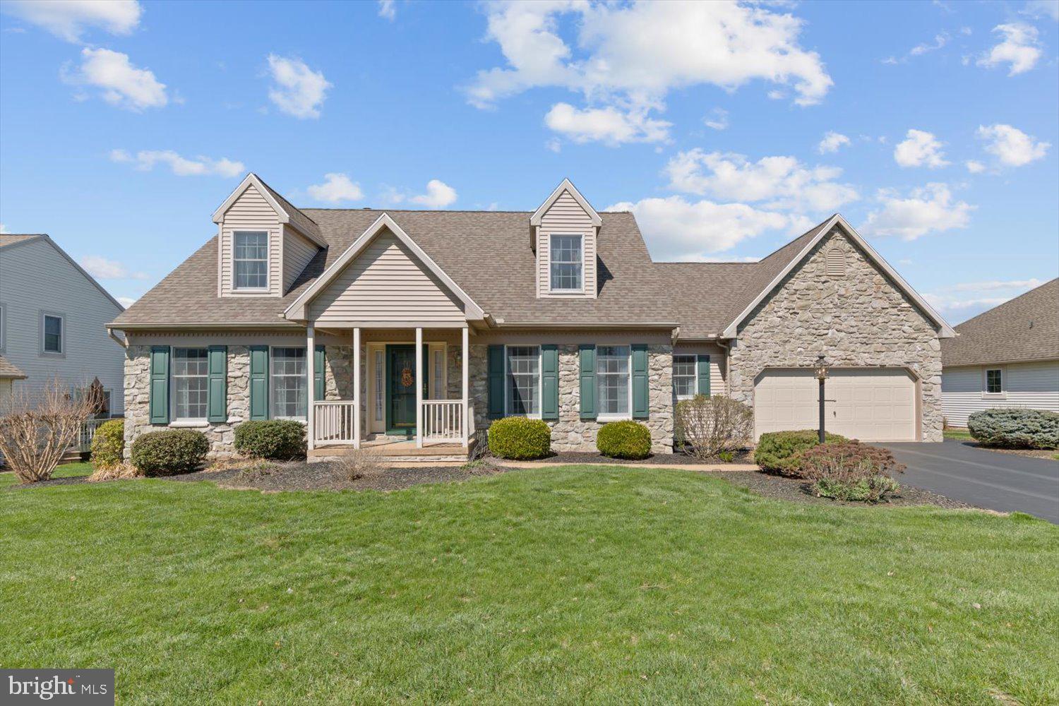 34 Ream Road Stevens, PA 17578 - Photo 1 of 53 a front view of a house with garden