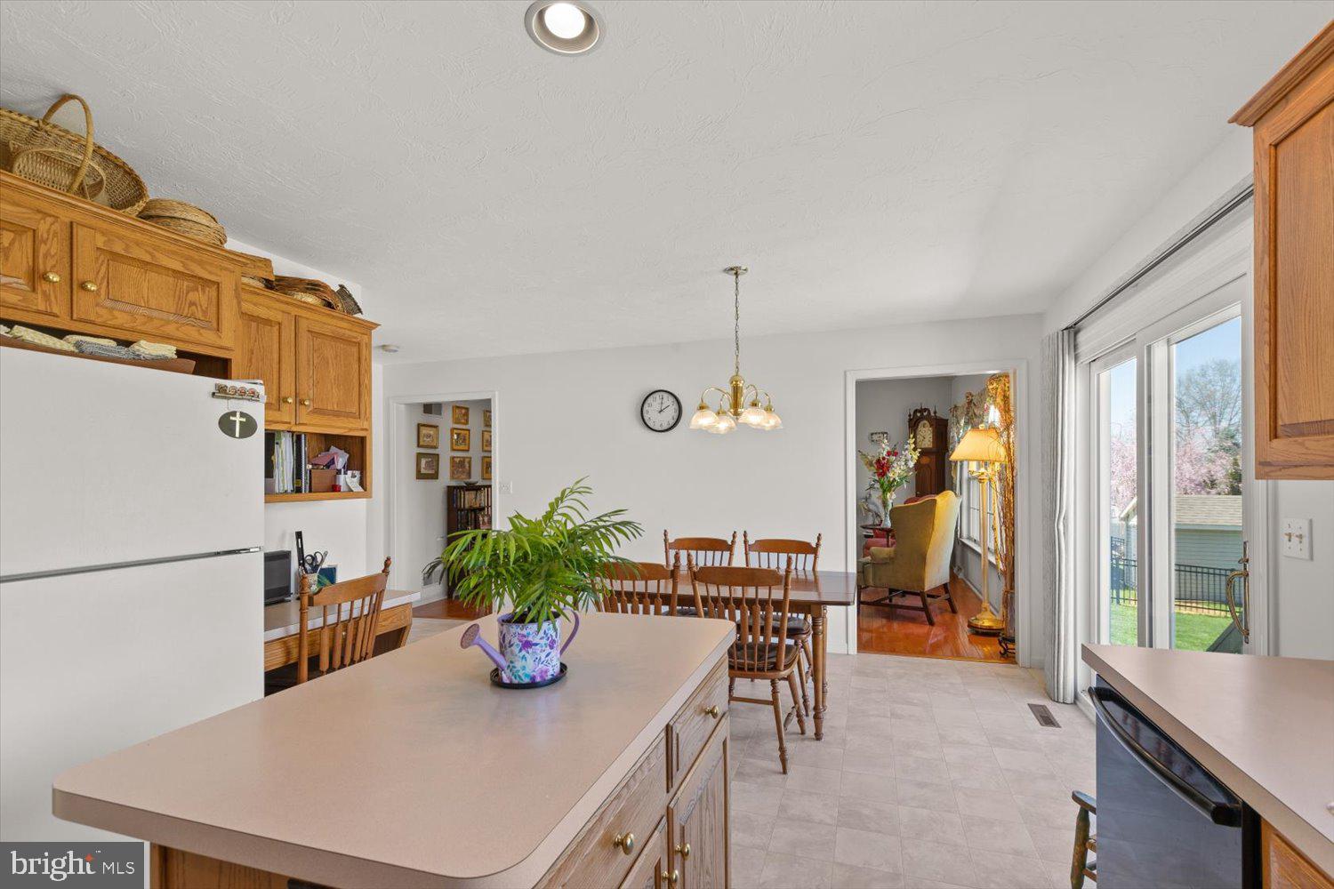 34 Ream Road Stevens, PA 17578 - Photo 12 of 53 a view of a dining room with furniture window and wooden floor