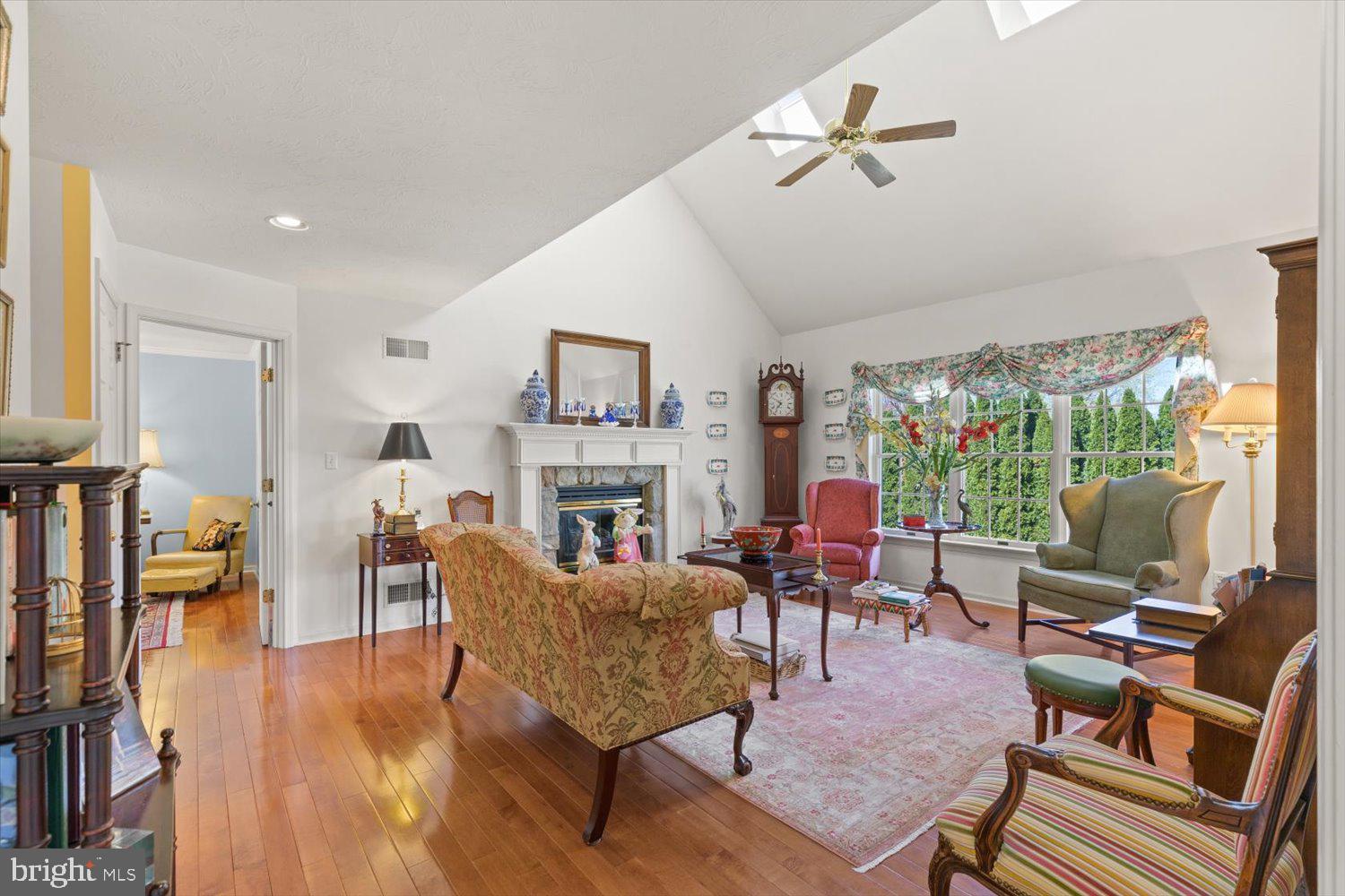 34 Ream Road Stevens, PA 17578 - Photo 15 of 53 a living room with fireplace furniture and a large window