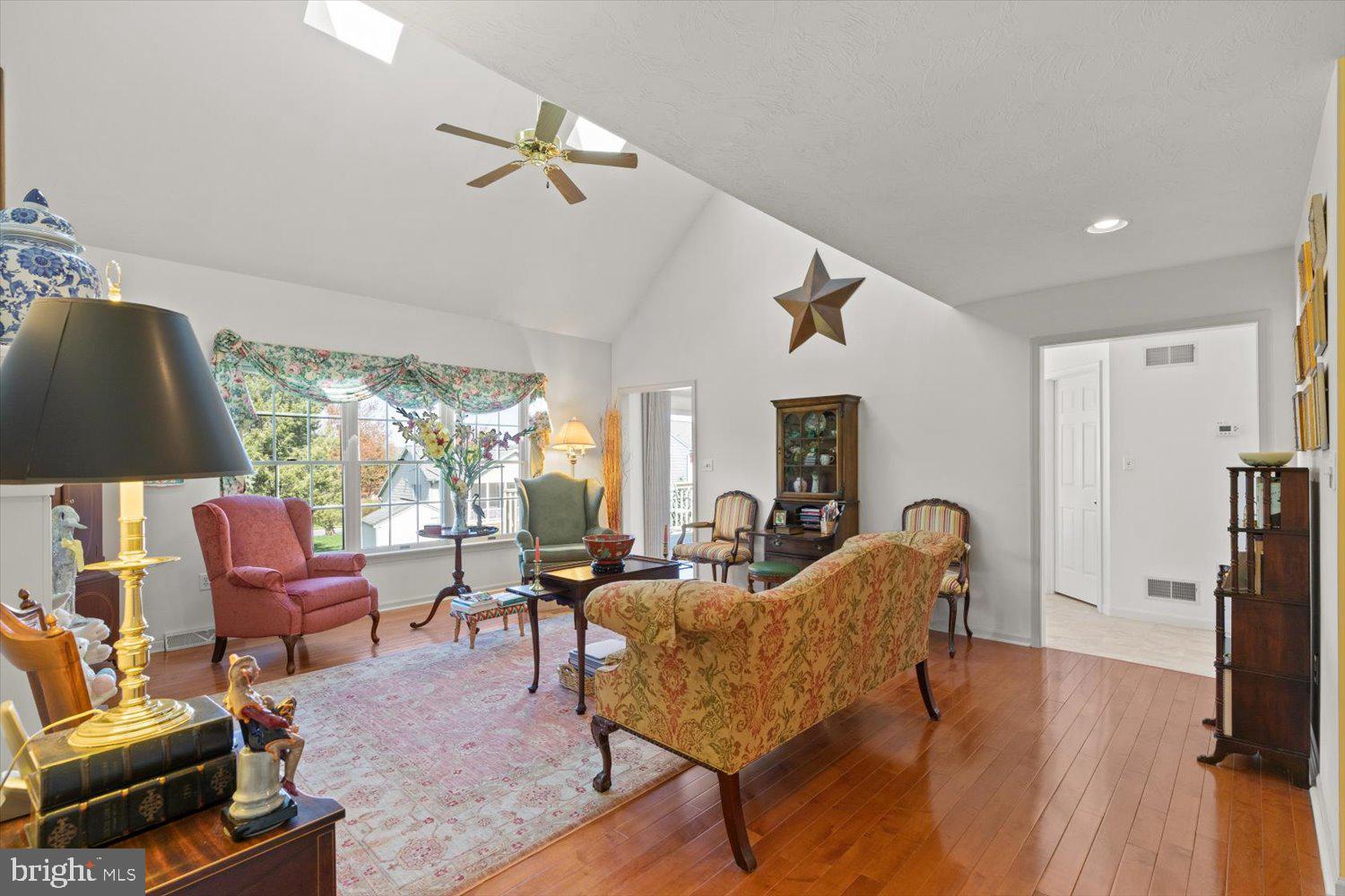 34 Ream Road Stevens, PA 17578 - Photo 17 of 53 a living room with furniture a flat screen tv and a large window