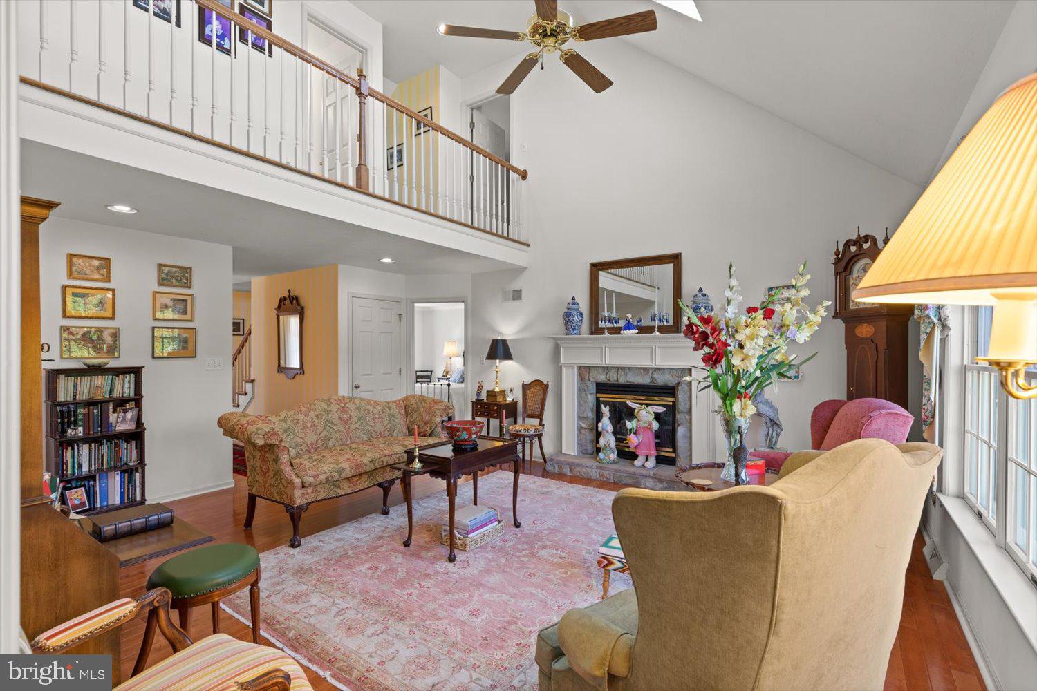 34 Ream Road Stevens, PA 17578 - Photo 18 of 53 a living room with furniture a fireplace and a potted plant
