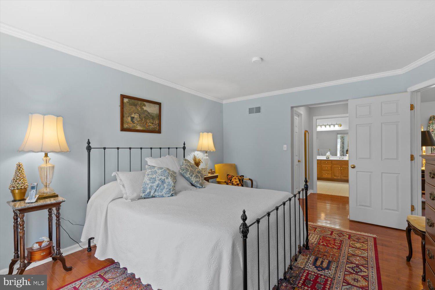 34 Ream Road Stevens, PA 17578 - Photo 20 of 53 a bedroom with a bed and a lamp on dresser