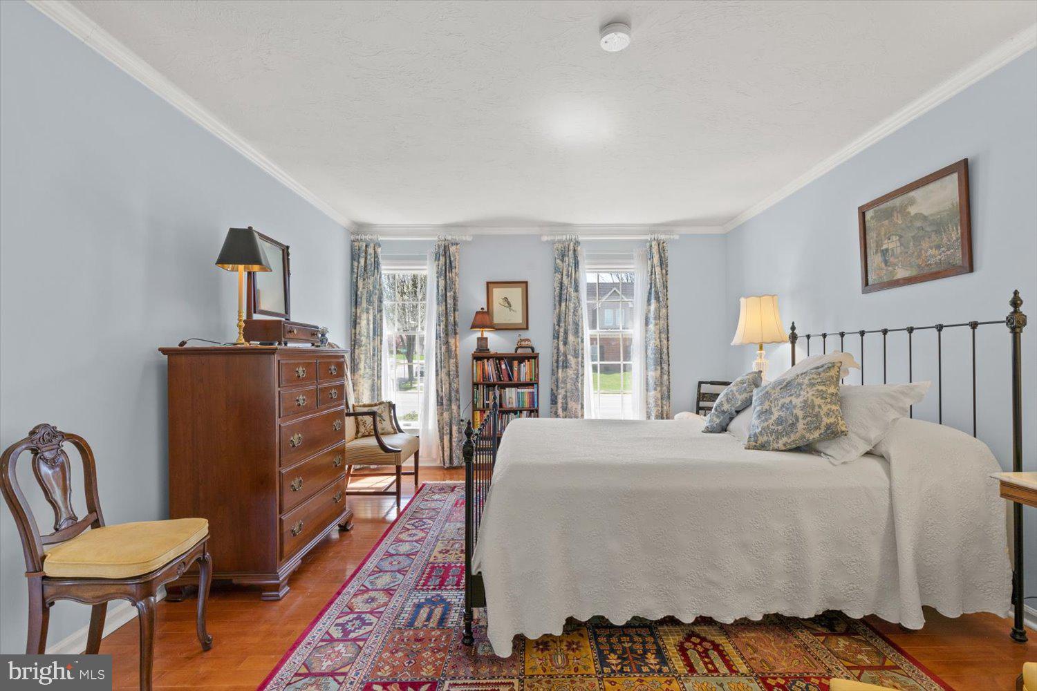 34 Ream Road Stevens, PA 17578 - Photo 21 of 53 a bedroom with a bed and wooden floor