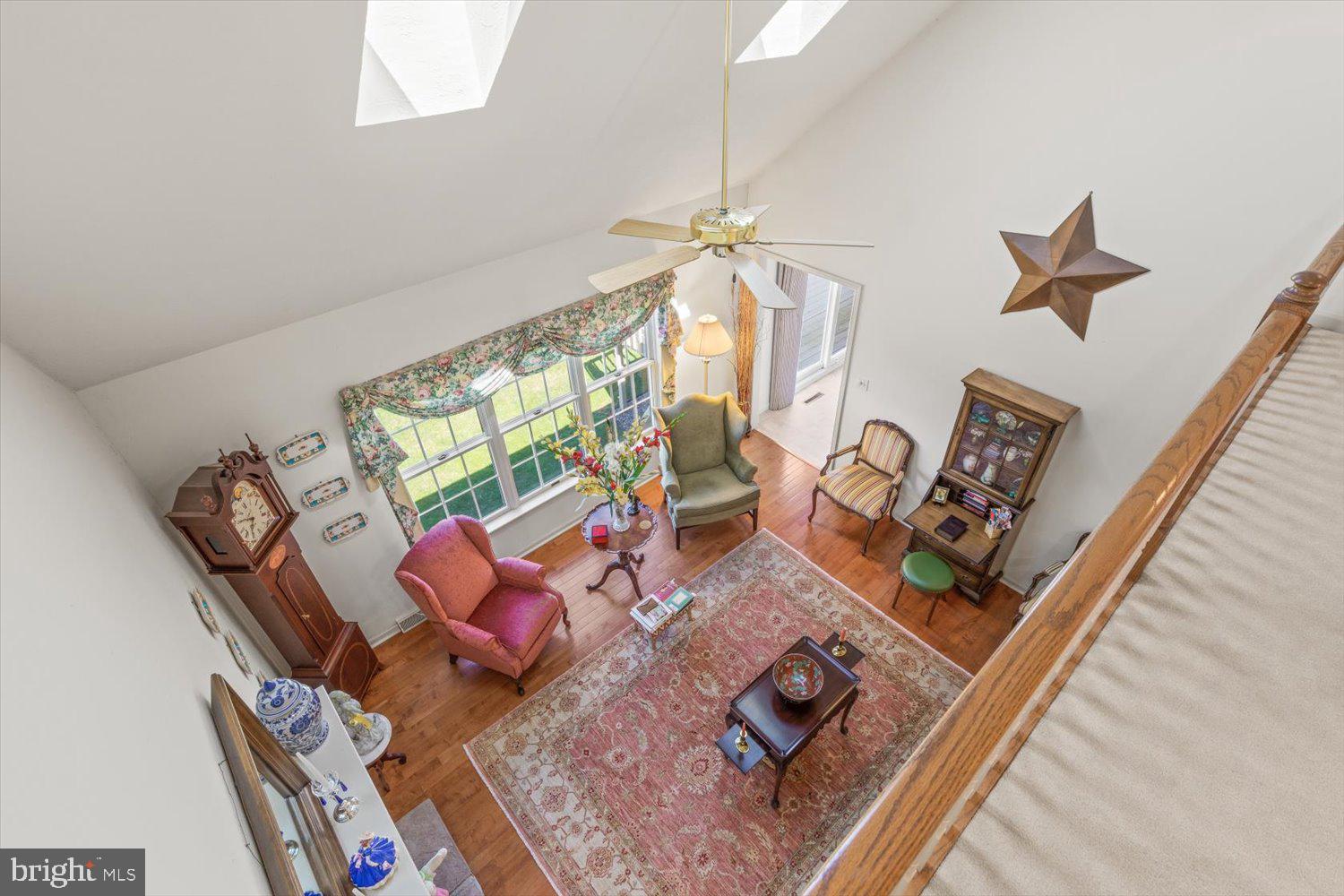 34 Ream Road Stevens, PA 17578 - Photo 29 of 53 wooden floor living room with furniture and a window