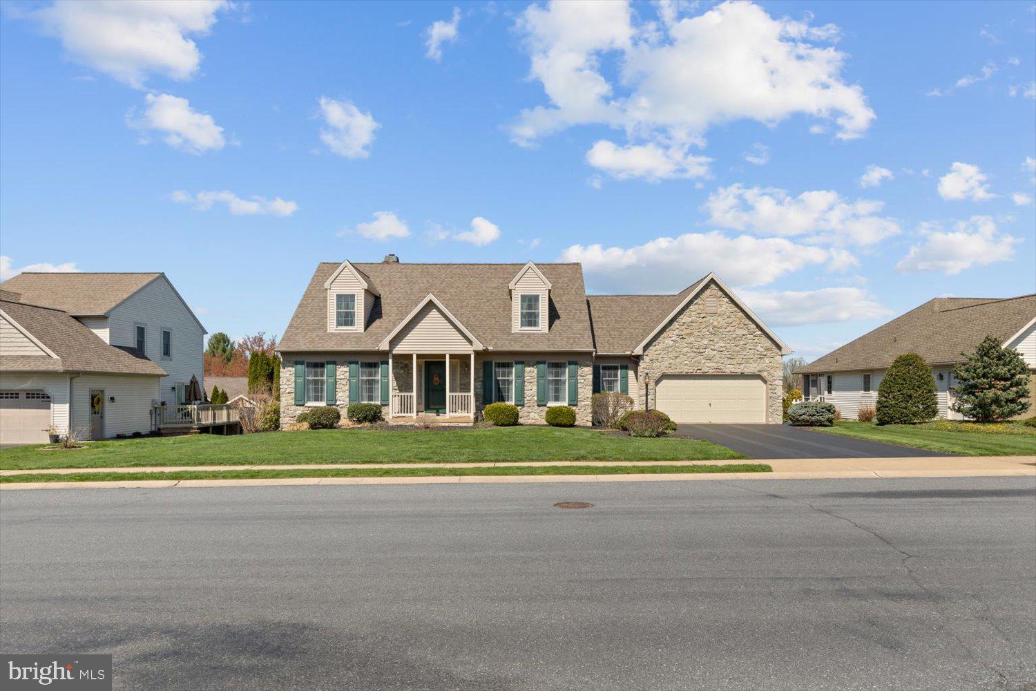 34 Ream Road Stevens, PA 17578 - Photo 53 of 53 front view of a house next to a big yard