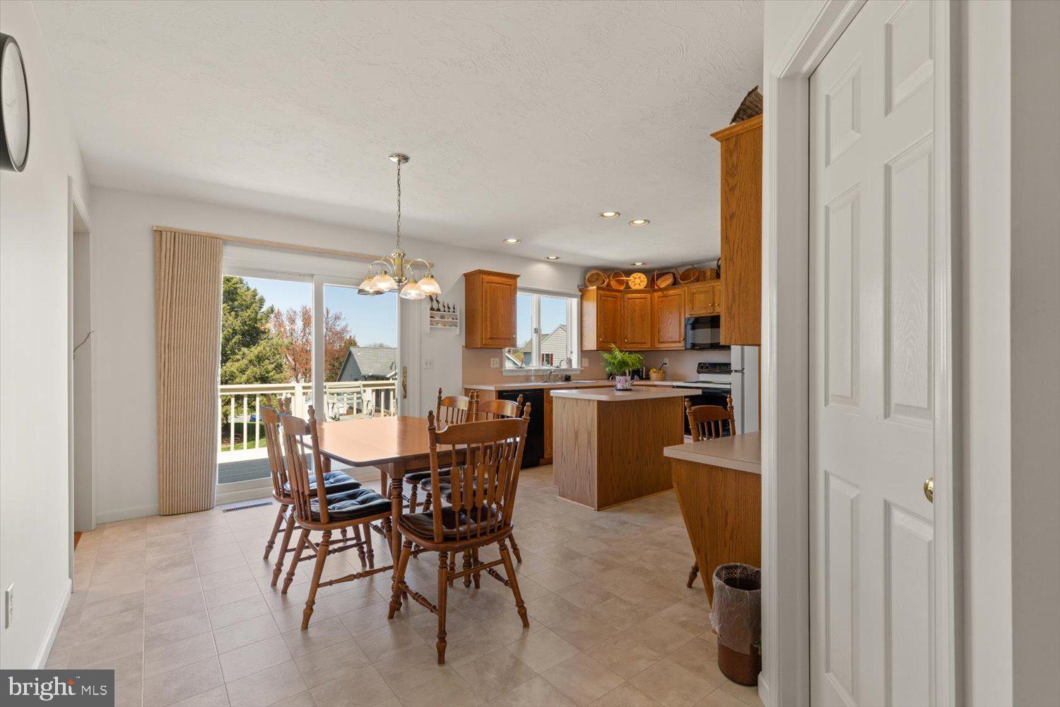 34 Ream Road Stevens, PA 17578 - Photo 8 of 53 a view of a dining room and kitchen with a table chairs