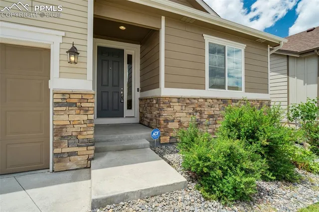 a view of house with outdoor space