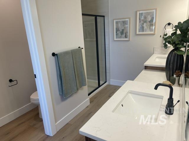 2035 Sumac Avenue Middleton, ID 83644 - Photo 7 of 17 Bathroom with dual sinks and a separate water closet